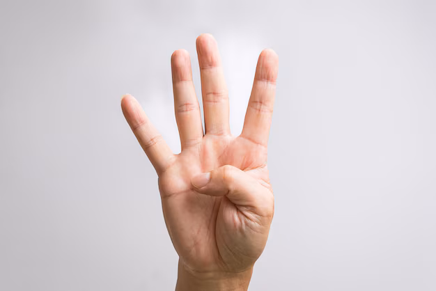 hand-showing-four-fingers_672855-1676